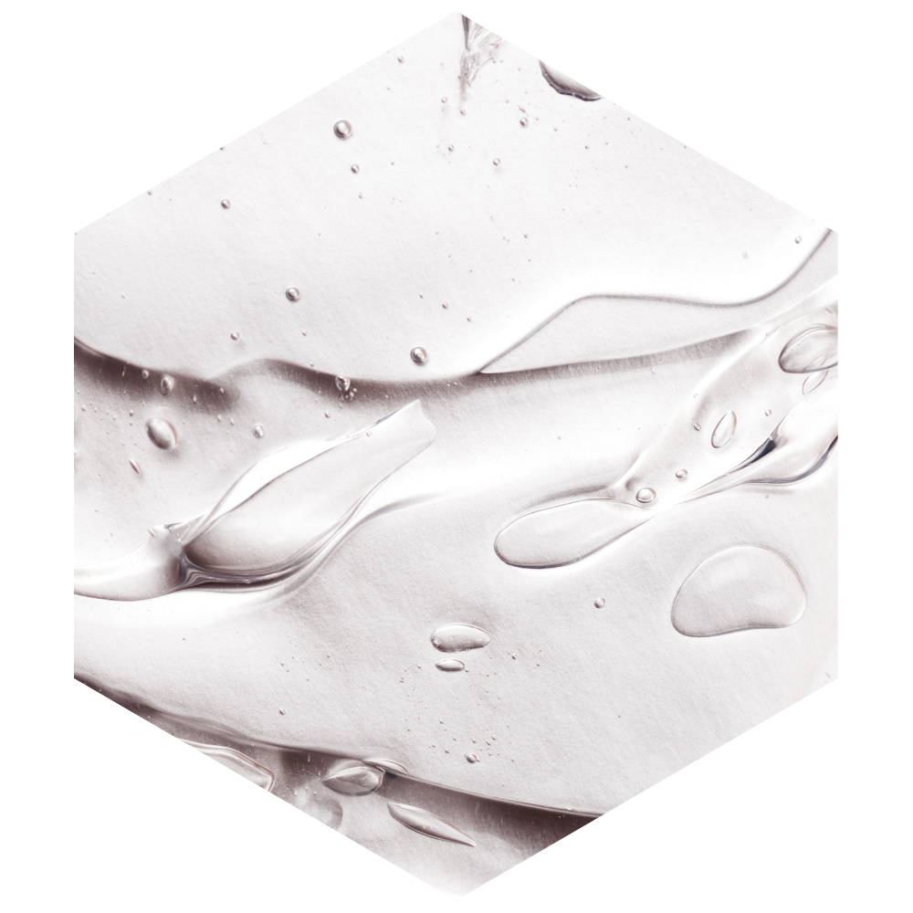 Close-up of a textured white surface with water droplets