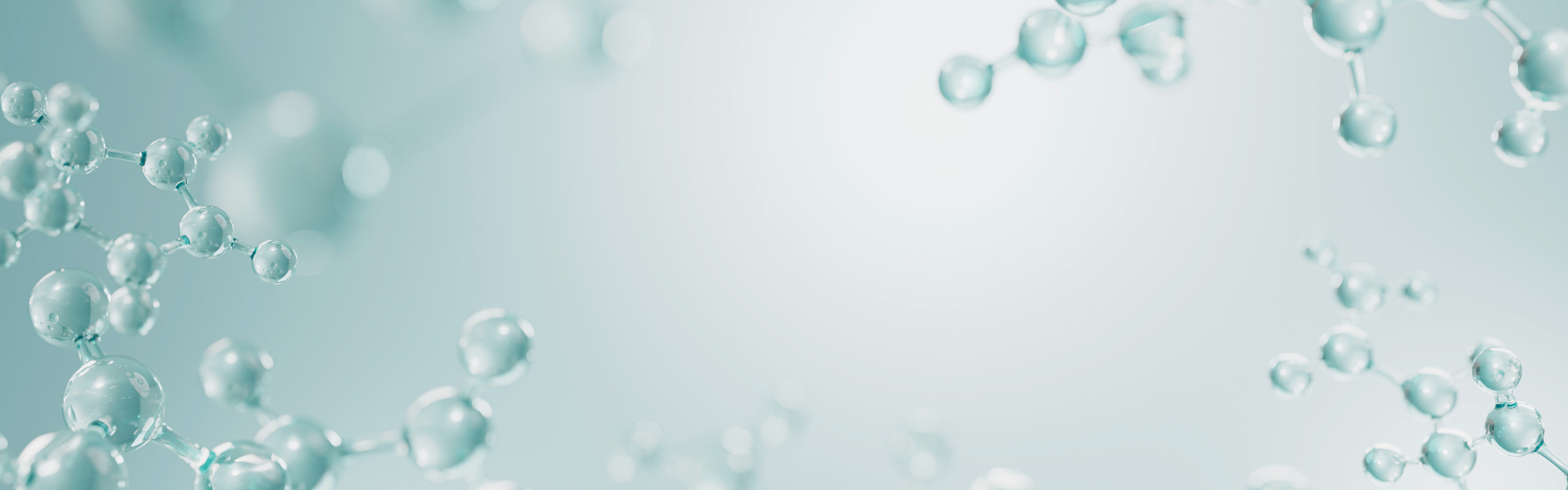 Close-up of water droplets on a light blue background